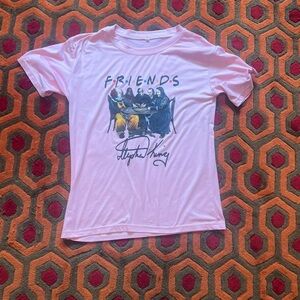 Light Pink Stephen king friends tee new women’s tee. Fits size small-medium